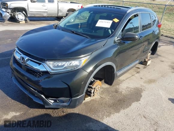 ✅ 2018 Honda CR-V Touring • VIN: 7FARW2H90JE052921 • Lot: 43671364. Listed on IAAI with 101,261 mi. Free auction sales archive from the USA and detailed vehicle history report at DreamBid. Image 2.
