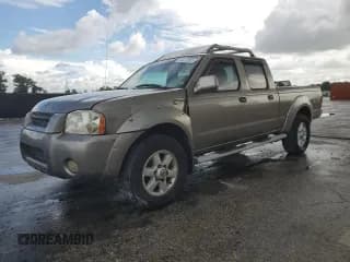 ✅ 2003 Nissan Frontier XE • VIN: 1N6ED29X33C464373 • Лот: 70272955. Опубликован ранее на Copart с пробегом 249 282 миль. Бесплатный доступ к архиву аукционных продаж из США и подробный отчёт об истории автомобиля на DreamBid. Изображение 1.