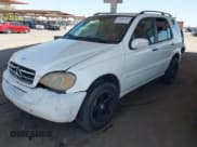 ✅ 2004 Mercedes-Benz M 500 • VIN: 4JGAB75E54A513252 • Lot: 42466562. Listed on IAAI with 162,812 mi. Free auction sales archive from the USA and detailed vehicle history report at DreamBid. Image 2.