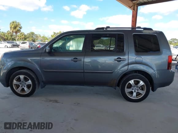 ✅ 2013 Honda Pilot EX-L • VIN: 5FNYF3H59DB001657 • Lot: 43445423. Listed on IAAI with 170,606 mi. Free auction sales archive from the USA and detailed vehicle history report at DreamBid. Image 14.