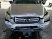 2006 Honda Pilot LX with VIN 5FNYF18116B012124, listed as a Copart auction lot 82311145 with 159,515 mi miles and Salvage title. Bid and sale history available at DreamBid. Image 12.