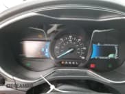 ✅ 2017 Ford Fusion Hybrid Titanium • VIN: 3FA6P0RU7HR187914 • Lot: 82234005. Listed on Copart with 290,959 mi. Free auction sales archive from the USA and detailed vehicle history report at DreamBid. Image 9.