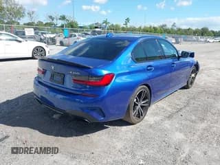 ✅ 2021 BMW 3 Series M340i • VIN: 3MW5U7J01M8B63122 • Lot: 43583344. Listed on IAAI with 73,945 mi. Free auction sales archive from the USA and detailed vehicle history report at DreamBid. Image 4.
