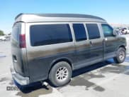✅ 2004 Chevrolet Express Passenger • VIN: 1GBFG15T641128908 • Lot: 42729249. Listed on IAAI with 207,057 mi. Free auction sales archive from the USA and detailed vehicle history report at DreamBid. Image 4.
