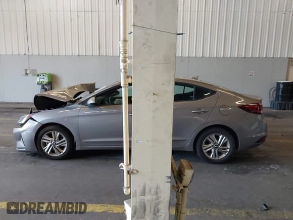 ✅ 2020 Hyundai Elantra SEL • VIN: KMHD84LFXLU099324 • Lot: 43377345. Listed on IAAI with 61,600 mi. Free auction sales archive from the USA and detailed vehicle history report at DreamBid. Image 14.