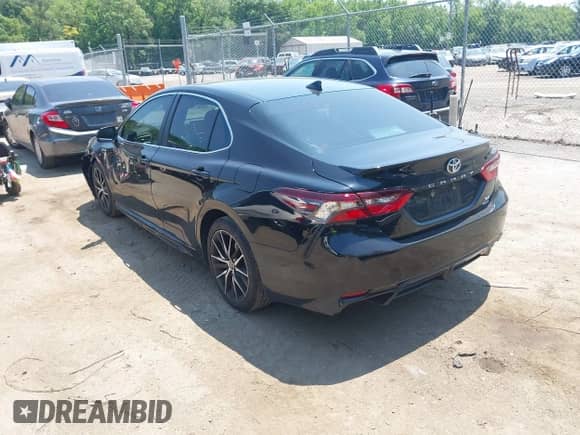 2021 Toyota Camry SE with VIN 4T1G11BK6MU036852, listed as a IAAI auction lot 42590115 with 79,752 mi miles and . Bid and sale history available at DreamBid. Image 3.