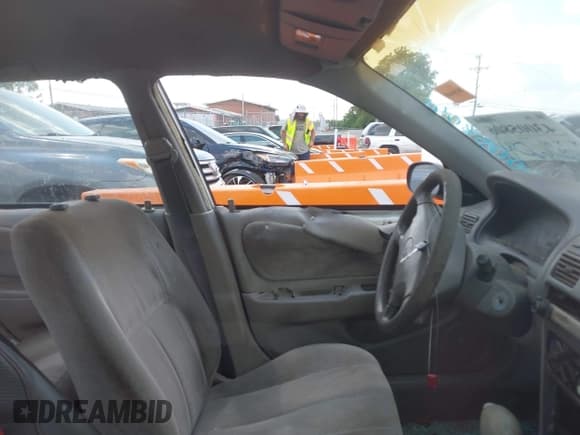 ✅ 1999 Toyota Corolla VE • VIN: 1NXBR12E2XZ214726 • Lot: 43005806. Listed on IAAI with 295,368 mi. Free auction sales archive from the USA and detailed vehicle history report at DreamBid. Image 5.