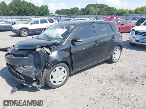 ✅ 2008 Scion xD • VIN: JTKKU10418J032136 • Lot: 42969663. Listed on IAAI with 164,004 mi. Free auction sales archive from the USA and detailed vehicle history report at DreamBid. Image 2.