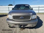 ✅ 2001 Ford Expedition Eddie Bauer • VIN: 1FMPU18LX1LB45615 • Lot: 82591105. Wystawiony na Copart z przebiegiem 334 408 mil. Bezpłatny archiwum sprzedaży aukcyjnych z USA i szczegółowy raport historii pojazdu na DreamBid. Zdjęcie 5.