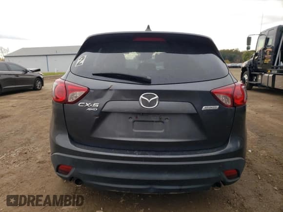 ✅ 2014 Mazda CX-5 Grand Touring • VIN: JM3KE4DY9E0368600 • Лот: 90886195. Опубликован ранее на Copart с пробегом 191 358 миль. Бесплатный доступ к архиву аукционных продаж из США и подробный отчёт об истории автомобиля на DreamBid. Изображение 6.