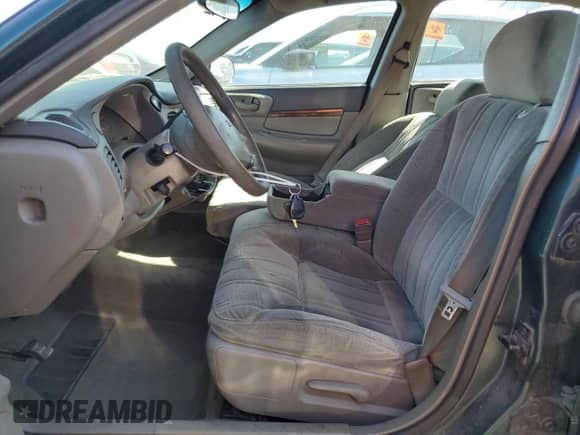 2001 Chevrolet Impala z VIN 2G1WF52E219358120, wystawiony jako Copart lot #69834064 z przebiegiem 151 769 mil mil oraz Szkoda całkowita • Salvage title. Historia ofert i sprzedaży dostępna na DreamBid. Obrazek 7.