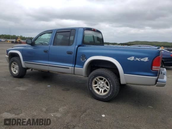 2004 Dodge Dakota SLT z VIN 1D7HG48K04S739865, wystawiony jako Copart lot #57867265 z przebiegiem 214 698 mil mil oraz Czysty tytuł • Clean title. Historia ofert i sprzedaży dostępna na DreamBid. Obrazek 2.