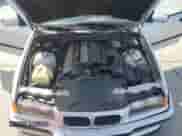 1998 BMW 3 Series 328i with VIN WBACD4322WAV65078, listed as a Copart auction lot 48259125 with 158,640 mi miles and Salvage title. Bid and sale history available at DreamBid. Image 12.