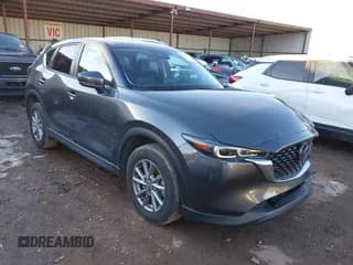 ✅ 2022 Mazda CX-5 S Carbon Edition • VIN: JM3KFBCM2N0589889 • Lot: 41321195. Wystawiony na IAAI z przebiegiem 36 871 mil. Bezpłatny archiwum sprzedaży aukcyjnych z USA i szczegółowy raport historii pojazdu na DreamBid. Zdjęcie 1.