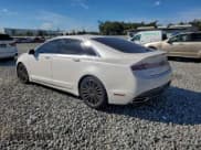 ✅ 2015 Lincoln MKZ Hybrid • VIN: 3LN6L2LU1FR628441 • Lot: 94491825. Listed on Copart with 210,716 mi. Free auction sales archive from the USA and detailed vehicle history report at DreamBid. Image 2.