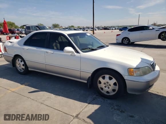 ✅ 1998 Acura RL Special Edition • VIN: JH4KA9687WC013499 • Lot: 72534404. Listed on Copart with 174,720 mi. Free auction sales archive from the USA and detailed vehicle history report at DreamBid. Image 4.