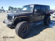 ✅ 2016 Jeep Wrangler Unlimited Rubicon Hard Rock • VIN: 1C4BJWFG9GL209484 • Lot: 87815475. Listed on Copart with 85,729 mi. Free auction sales archive from the USA and detailed vehicle history report at DreamBid. Image 1.