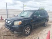 ✅ 2007 Honda Pilot EX-L • VIN: 5FNYF28507B019981 • Lot: 42935921. Listed on IAAI with 234,868 mi. Free auction sales archive from the USA and detailed vehicle history report at DreamBid. Image 2.