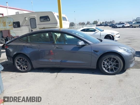 ✅ 2023 Tesla Model 3 • VIN: 5YJ3E1EA2PF668853 • Lot: 42316581. Listed on IAAI with 16,859 mi. Free auction sales archive from the USA and detailed vehicle history report at DreamBid. Image 14.