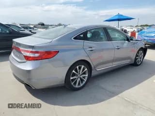✅ 2015 Hyundai Azera • VIN: KMHFG4JG4FA453156 • Лот: 86844795. Опубликован ранее на Copart с пробегом 104 948 миль. Бесплатный доступ к архиву аукционных продаж из США и подробный отчёт об истории автомобиля на DreamBid. Изображение 3.