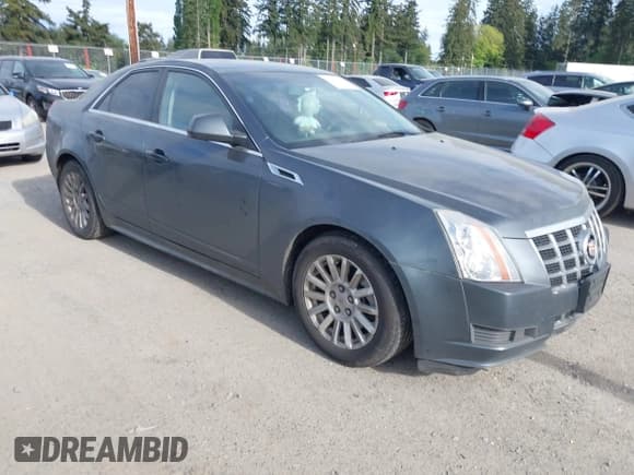 ✅ 2012 Cadillac CTS • VIN: 1G6DC5E55C0150770 • Lot: 42201626. Listed on IAAI with 238,753 mi. Free auction sales archive from the USA and detailed vehicle history report at DreamBid. Image 1.