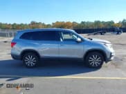 ✅ 2021 Honda Pilot EX-L • VIN: 5FNYF6H50MB082503 • Лот: 43598260. Опубликован ранее на IAAI с пробегом 74 247 миль. Бесплатный доступ к архиву аукционных продаж из США и подробный отчёт об истории автомобиля на DreamBid. Изображение 13.