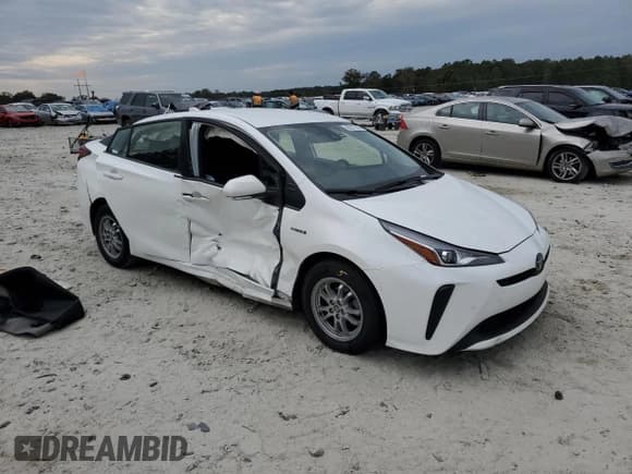 ✅ 2022 Toyota Prius LE • VIN: JTDKAMFU6N3182140 • Lot: 82677565. Wystawiony na Copart z przebiegiem 79 813 mil. Bezpłatny archiwum sprzedaży aukcyjnych z USA i szczegółowy raport historii pojazdu na DreamBid. Zdjęcie 4.