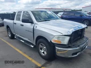 ✅ 2011 Ram 1500 SLT • VIN: 1D7RB1GP2BS500684 • Lot: 42133329. Listed on IAAI with 124,095 mi. Free auction sales archive from the USA and detailed vehicle history report at DreamBid. Image 1.