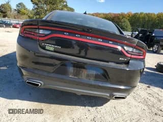 ✅ 2018 Dodge Charger SXT Plus • VIN: 2C3CDXHGXJH176597 • Лот: 89841405. Опубликован ранее на Copart с пробегом 133 999 миль. Бесплатный доступ к архиву аукционных продаж из США и подробный отчёт об истории автомобиля на DreamBid. Изображение 6.