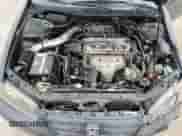 2001 Honda Accord EX z VIN 1HGCG56641A148327, wystawiony jako Copart lot #56532165 z przebiegiem 219 127 mil mil oraz Czysty tytuł • Clean title. Historia ofert i sprzedaży dostępna na DreamBid. Obrazek 11.