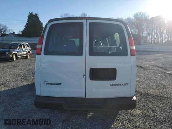 2005 Chevrolet Express Passenger с VIN 1GAGG25V051202535, выставлен на аукционе Copart как лот 86716874 с пробегом 202 331 миль миль и Списание • Salvage title. История ставок и продаж доступна на DreamBid. Изображение 6.