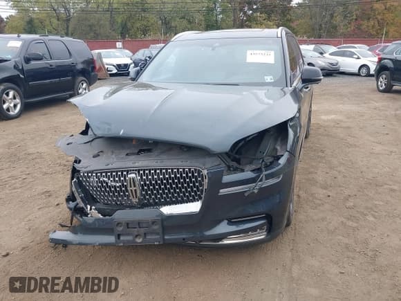 ✅ 2021 Lincoln Aviator Reserve • VIN: 5LM5J7XC2MGL02049 • Лот: 43573232. Опубликован ранее на IAAI с пробегом 77 860 миль. Бесплатный доступ к архиву аукционных продаж из США и подробный отчёт об истории автомобиля на DreamBid. Изображение 17.