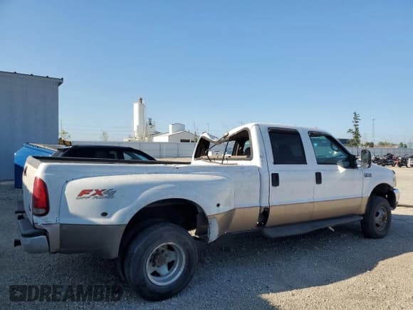 ✅ 1999 Ford F-350 XL • VIN: 1FTWW33FXXEA06489 • Lot: 71281885. Listed on Copart with 241,882 mi. Free auction sales archive from the USA and detailed vehicle history report at DreamBid. Image 3.