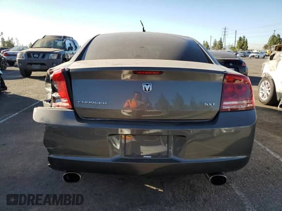 2008 Dodge Charger SXT с VIN 2B3KA33G58H215978, выставлен на аукционе Copart как лот 77192774 с пробегом 168 838 миль миль и Списание • Salvage title. История ставок и продаж доступна на DreamBid. Изображение 6.