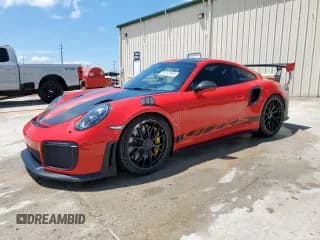 ✅ 2018 Porsche 911 GT2 RS • VIN: WP0AE2A90JS185090 • Lot: 56182905. Listed on Copart with 6,197 mi. Free auction sales archive from the USA and detailed vehicle history report at DreamBid. Image 1.
