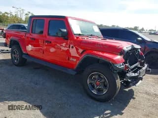 ✅ 2021 Jeep Gladiator Overland • VIN: 1C6HJTFG8ML587386 • Lot: 43663128. Listed on IAAI with 101,981 mi. Free auction sales archive from the USA and detailed vehicle history report at DreamBid. Image 1.
