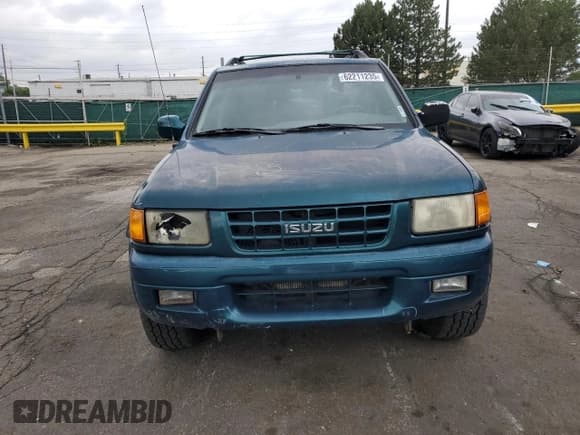 ✅ 1999 Isuzu Rodeo S • VIN: 4S2CM58W5X4313060 • Lot: 62211235. Wystawiony na Copart z przebiegiem 157 222 mil. Bezpłatny archiwum sprzedaży aukcyjnych z USA i szczegółowy raport historii pojazdu na DreamBid. Zdjęcie 5.