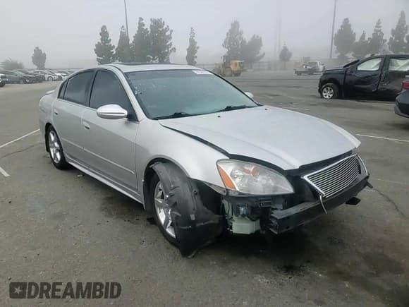 ✅ 2003 Nissan Altima SE • VIN: 1N4BL11E93C191121 • Lot: 82309335. Listed on Copart with 214,996 mi. Free auction sales archive from the USA and detailed vehicle history report at DreamBid. Image 14.