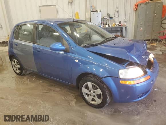 2005 Chevrolet Aveo LS z VIN KL1TD626X5B293852, wystawiony jako Copart lot #86274464 z przebiegiem 150 052 mil mil oraz Nie do naprawy • Non repairable. Historia ofert i sprzedaży dostępna na DreamBid. Obrazek 4.