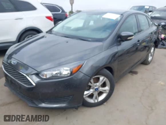 ✅ 2018 Ford Focus SE • VIN: 1FADP3FEXJL300524 • Lot: 43599068. Wystawiony na IAAI z przebiegiem 93 611 mil. Bezpłatny archiwum sprzedaży aukcyjnych z USA i szczegółowy raport historii pojazdu na DreamBid. Zdjęcie 16.