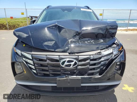 2023 Hyundai Tucson SEL with VIN 5NMJFCAE9PH266593, listed as a Copart auction lot 70394515 with 27,112 mi miles and Salvage title. Bid and sale history available at DreamBid. Image 5.