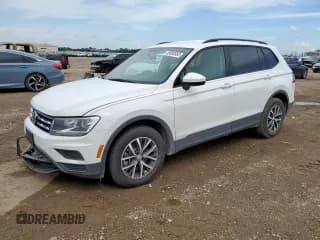 ✅ 2021 Volkswagen Tiguan S • VIN: 3VV1B7AX9MM021629 • Lot: 69080865. Listed on Copart with 64,079 mi. Free auction sales archive from the USA and detailed vehicle history report at DreamBid. Image 1.