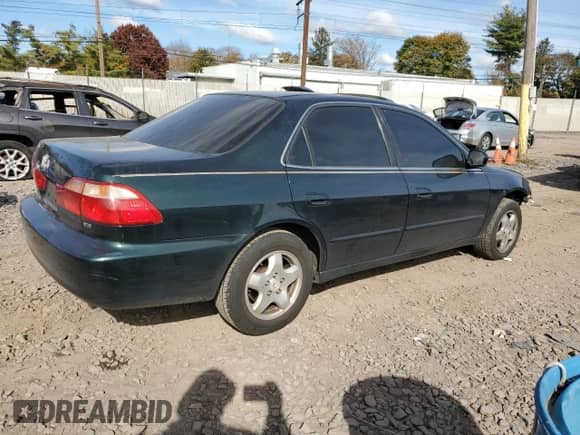 2000 Honda Accord EX с VIN 1HGCG1652YA084041, выставлен на аукционе Copart как лот 90147245 с пробегом 143 776 миль миль и Списание • Salvage title. История ставок и продаж доступна на DreamBid. Изображение 3.