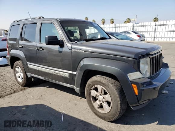 ✅ 2010 Jeep Liberty Sport • VIN: 1J4PN2GK1AW127903 • Lot: 91444845. Listed on Copart with 157,818 mi. Free auction sales archive from the USA and detailed vehicle history report at DreamBid. Image 4.