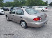 ✅ 1999 Toyota Corolla VE • VIN: 2T1BR12E3XC246635 • Lot: 42910962. Listed on IAAI with 252,704 mi. Free auction sales archive from the USA and detailed vehicle history report at DreamBid. Image 3.