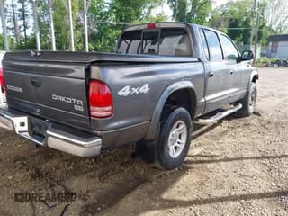 ✅ 2003 Dodge Dakota SLT • VIN: 1D7HG48N43S314433 • Lot: 42295334. Wystawiony na IAAI z przebiegiem 308 745 mil. Bezpłatny archiwum sprzedaży aukcyjnych z USA i szczegółowy raport historii pojazdu na DreamBid. Zdjęcie 4.
