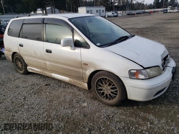 ✅ 1998 Honda Odyssey • VIN: RA31038664 • Lot: 43051785. Listed on Copart with 106,084 mi. Free auction sales archive from the USA and detailed vehicle history report at DreamBid. Image 4.
