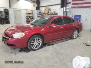 ✅ 2014 Chevrolet Impala LTZ • VIN: 2G1WC5E34E1122222 • Lot: 92826935. Listed on Copart with 201,368 mi. Free auction sales archive from the USA and detailed vehicle history report at DreamBid. Image 1.