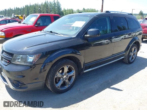 ✅ 2015 Dodge Journey Crossroad • VIN: 3C4PDDGGXFT607189 • Lot: 42475316. Listed on IAAI with 186,317 mi. Free auction sales archive from the USA and detailed vehicle history report at DreamBid. Image 2.