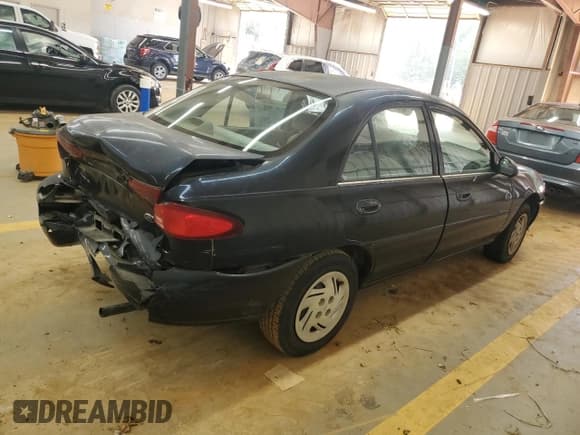 ✅ 1999 Ford Escort LX • VIN: 1FAFP10P2XW288030 • Lot: 66462185. Listed on Copart with 174,029 mi. Free auction sales archive from the USA and detailed vehicle history report at DreamBid. Image 3.